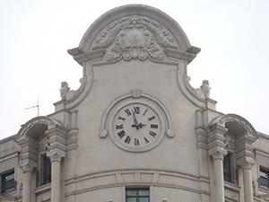 Silhouette Exterior Clock with Roman Numerals